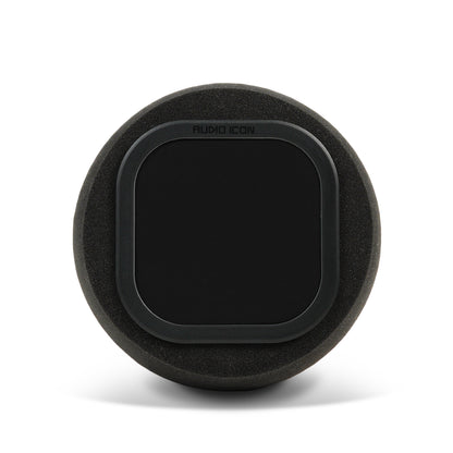 Audio Icon 7A black Iso Booth Foam facing forward on surface with shadow
