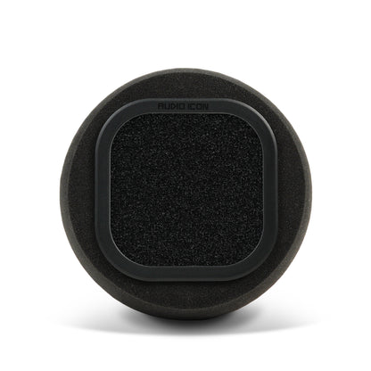 Audio Icon 7B foam pop filter and Iso Booth Foam facing forward on surface with shadow