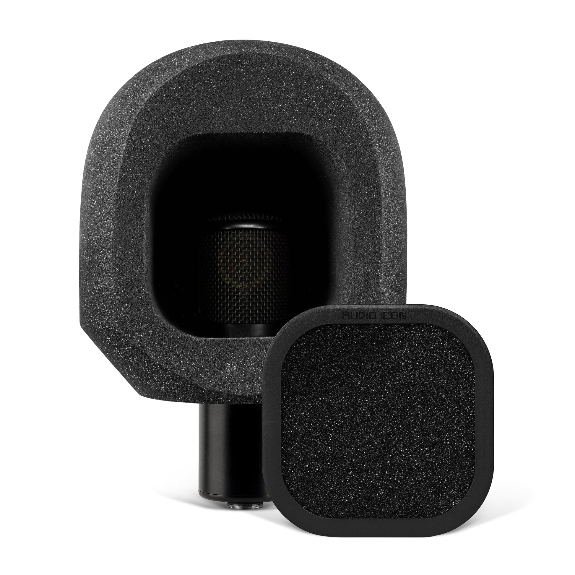 Microphone sitting on white table with the SoundBox C80 on it, with a Foam Pop Filter on the table