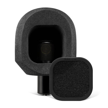 Microphone sitting on white table with the SoundBox C80 on it, with a Foam Pop Filter on the table