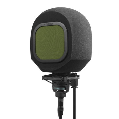 Studio microphone with iso booth and green windscreen filter on a white background facing left