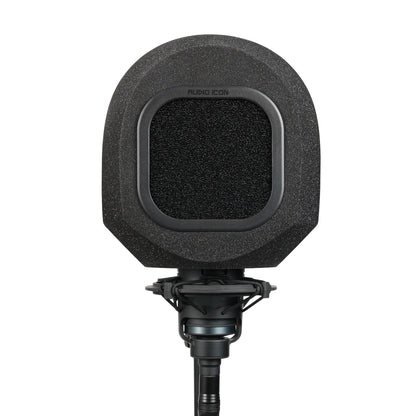 Studio microphone with SoundBox isolation booth over it with acoustic foam pop filter on a white background