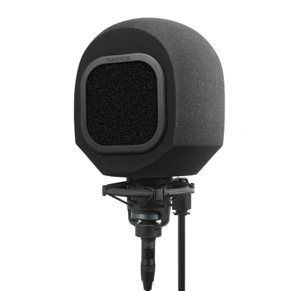 Studio microphone with iso booth and acoustic foam windscreen filter on a white background facing left