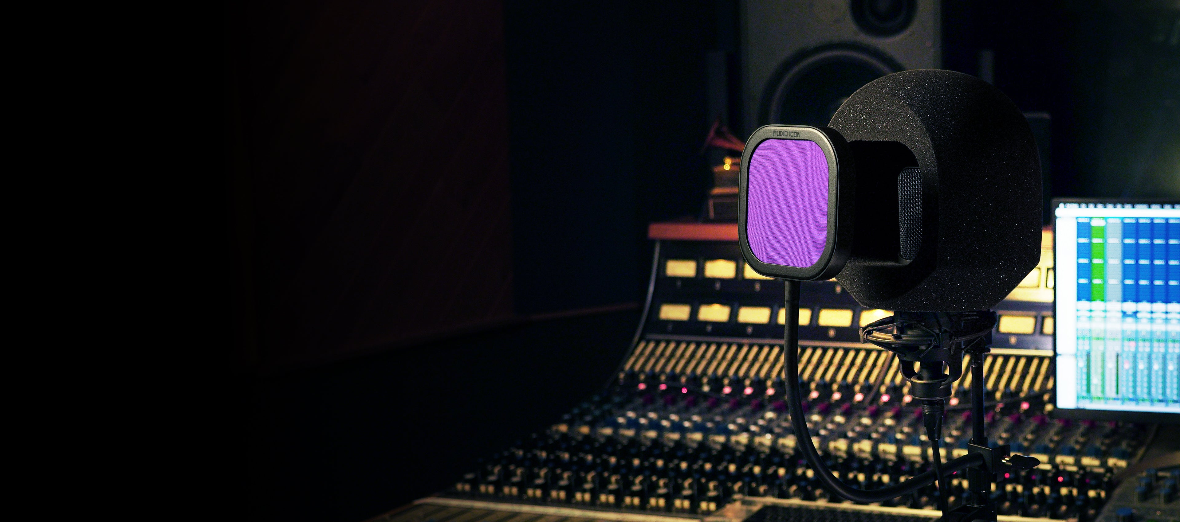 Soundbox iso booth with flex pro and a purple filter in front of a mixing console